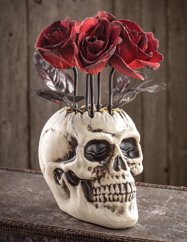 Schedelvaas met bewegende rozen